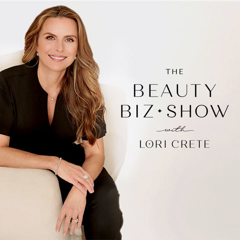 Logo for The Beauty Biz Show by Lori Crete featuring Lori in a black outfit smiling