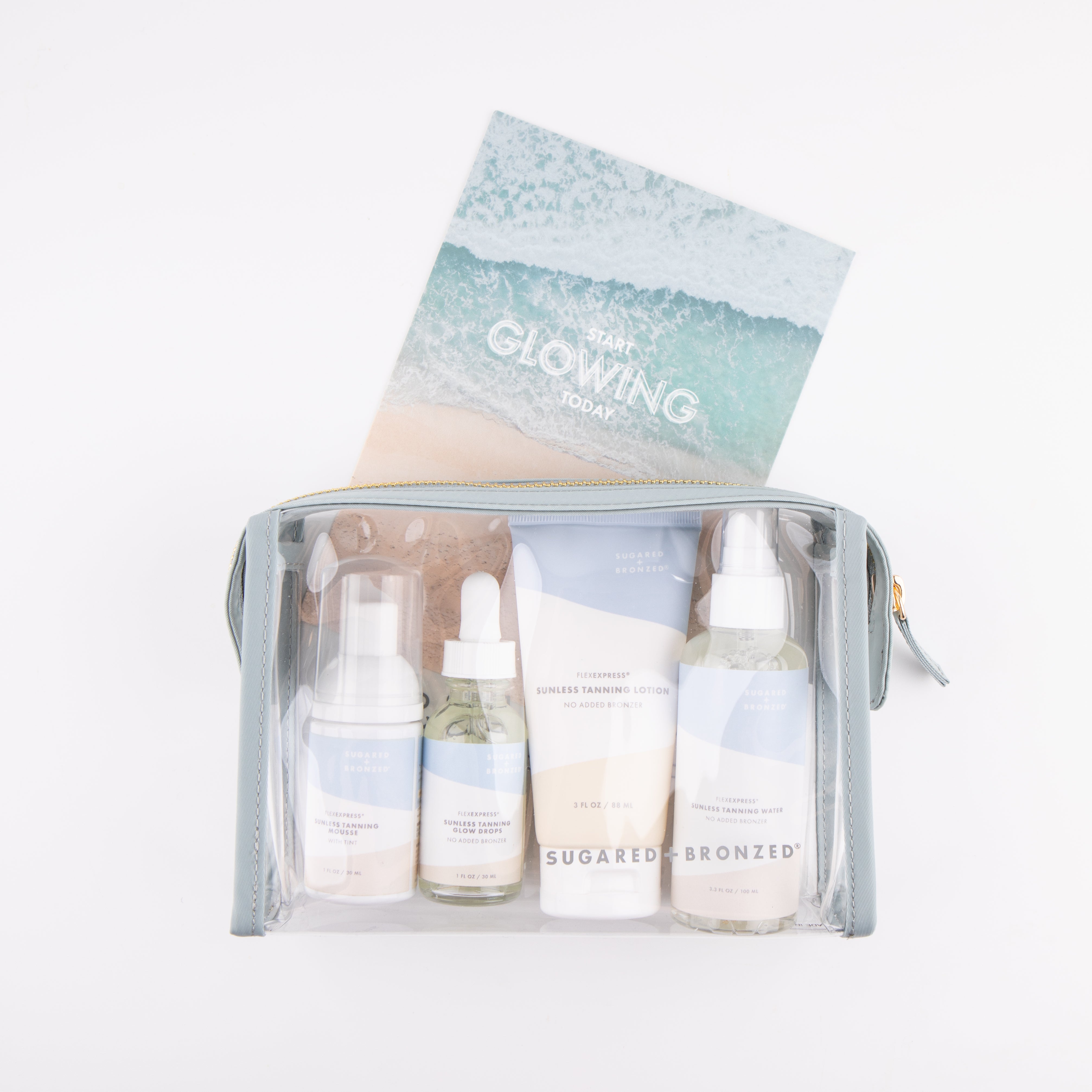 Large see-through bag containing bottles of Sugared and Bronzed tanning glow drops, tanning mousse, tanning lotion, and tanning water.