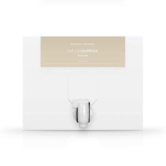 A white box with a dispenser faucet for Elixir One tanning solution
