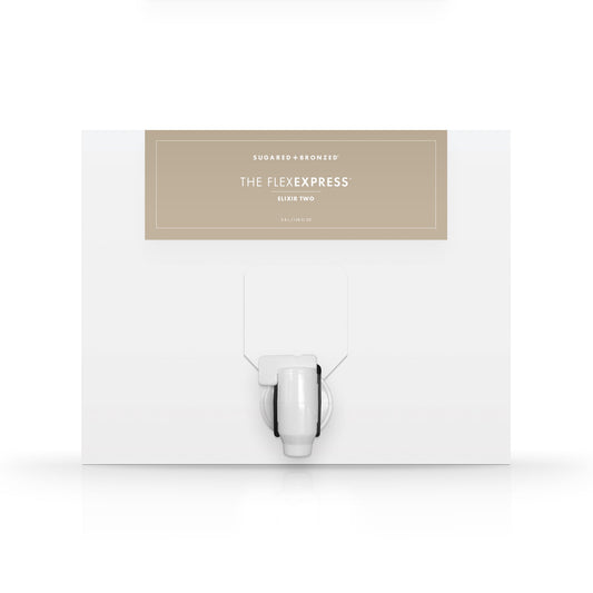 A white box with a dispenser faucet for Elixir Two tanning solution