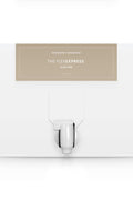 A white box with a dispenser faucet for Elixir Two tanning solution
