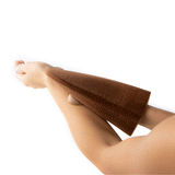 Animation of S+B Sunless Tanning Mousse getting scrubbed onto arm from a mitt