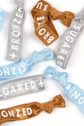 A 3 pack of Sugared and Bronzed hair ties
