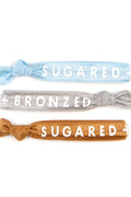 A 3 pack of Sugared and Bronzed hair ties